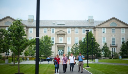 Students walking in the South Campus Quad. 