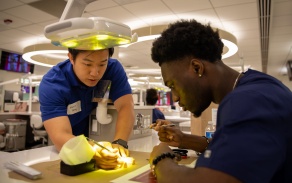 Students in the Destination Dental Program work together. 