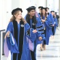 Photo of graduates at commencement. 