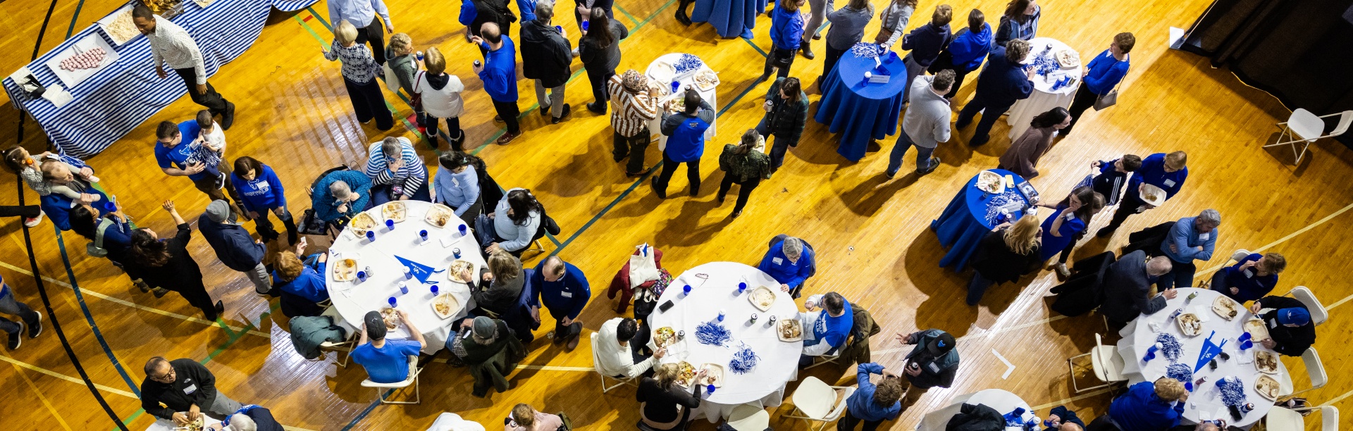 Staff, faculty, and their families connected to the Health Sciences programs gathered for a UB Bulls Women&rsquo;s Basketball game and reception in Alumni Arena in February 2026. 