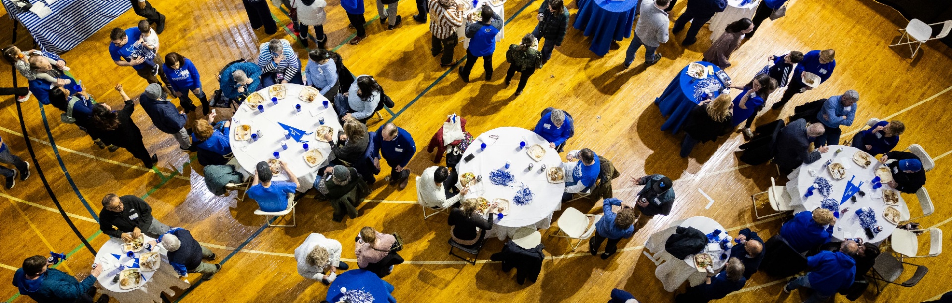 Staff, faculty, and their families connected to the Health Sciences programs gathered for a UB Bulls Women&rsquo;s Basketball game and reception in Alumni Arena in February 2026. 