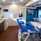 The a blue and white dental chair inside the UB Dental Mobile Dental Clinic. 