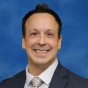 Portrait of Dr. Brett Chiquet. 