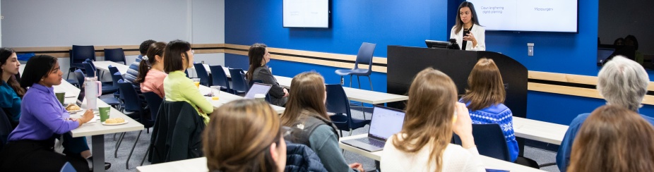 Students inside a classroom in Squire Hall. 