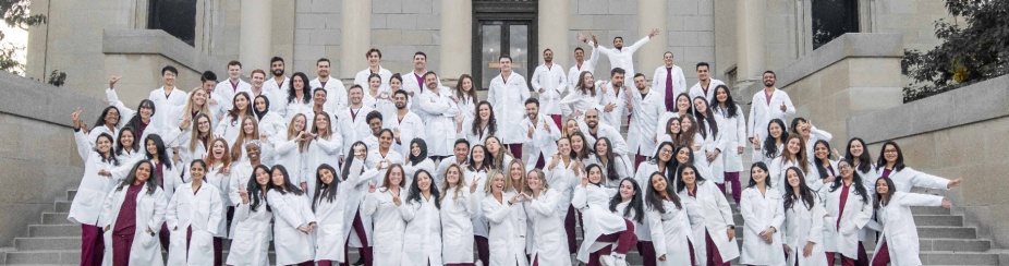 2024 Graduates posing in South Campus. 