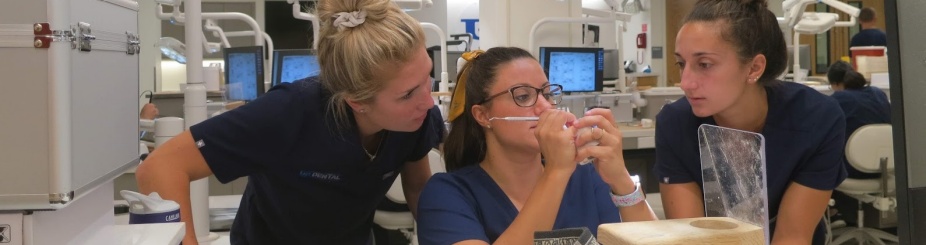 Group of UB SDM students working in the pre-clinic. 