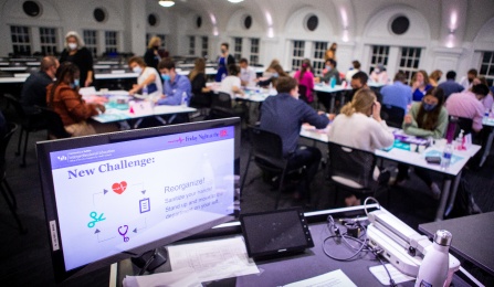 classroom with computer station in the foreground. 