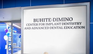 Photo of Buhite-Dimino Implant Center signage outside the lab. 
