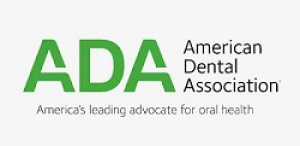 American Dental Association Logo in lime green and black lettering. 