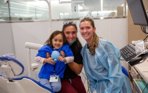 dental students helping children at Give Kids a Smile Day 2026. 