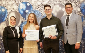 students posing with the dean and their award certificates for Senior Awards 2024. 