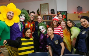 students pose in their costumes for the Ortho Halloween Party 2023. 