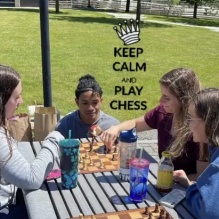 Chess Club members playing a game of chess. 