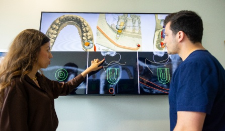Nathalia Paiva de Andrade, with the department of periodontics and endodontics in the School of Dental Medicine, is photographed in a Squire Hall clinic in November 2024. Paiva de Andrade is working with artificial intelligence to transform periodontal and dental care.