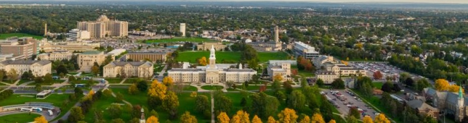 Aerial photos of the University Heights Neighborhood with the UB South Campus in the background.