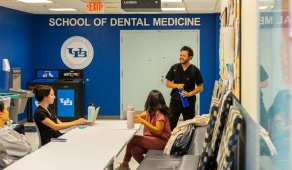 Students speaking in the lounge. 