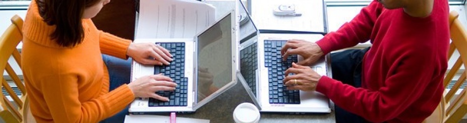 "students studying on laptops". 