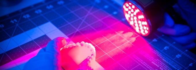 hands under a light. 