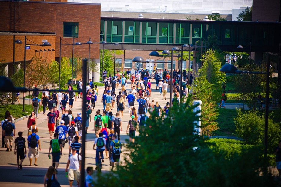 UB students walking in Founders Plaza. 