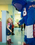 little girl with Buster Bison. 