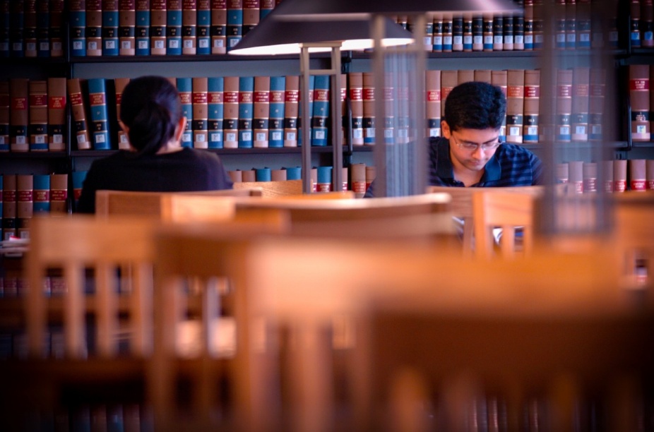 Students studying in a library.