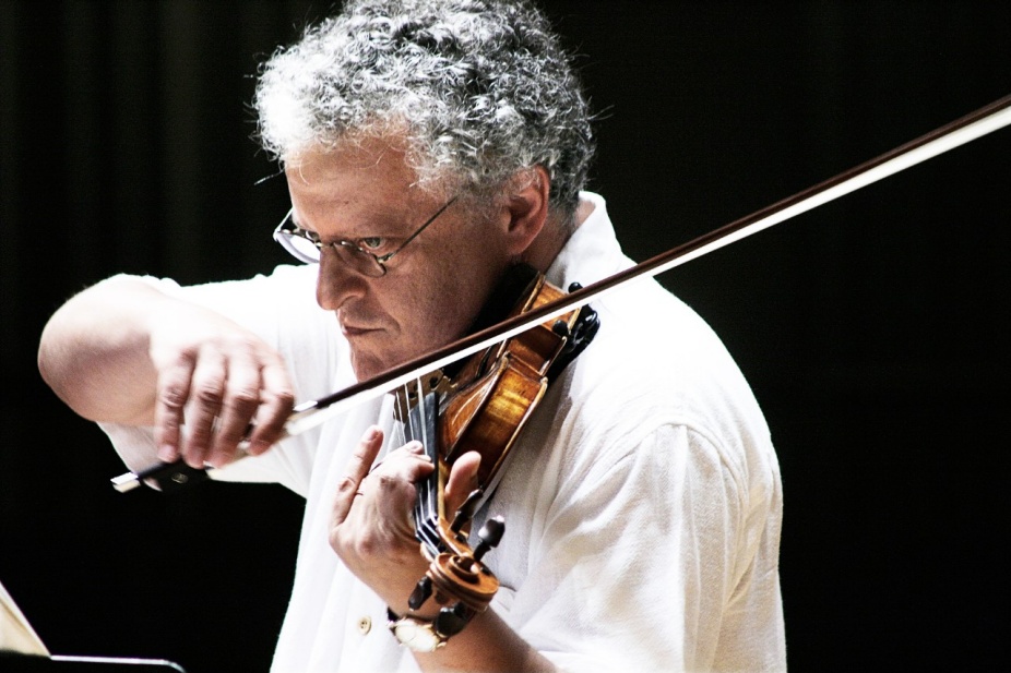Violinist Irvine Arditti playing the violin. 