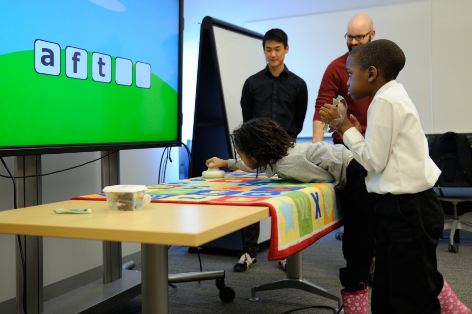 Students learning science in hands-on activity.