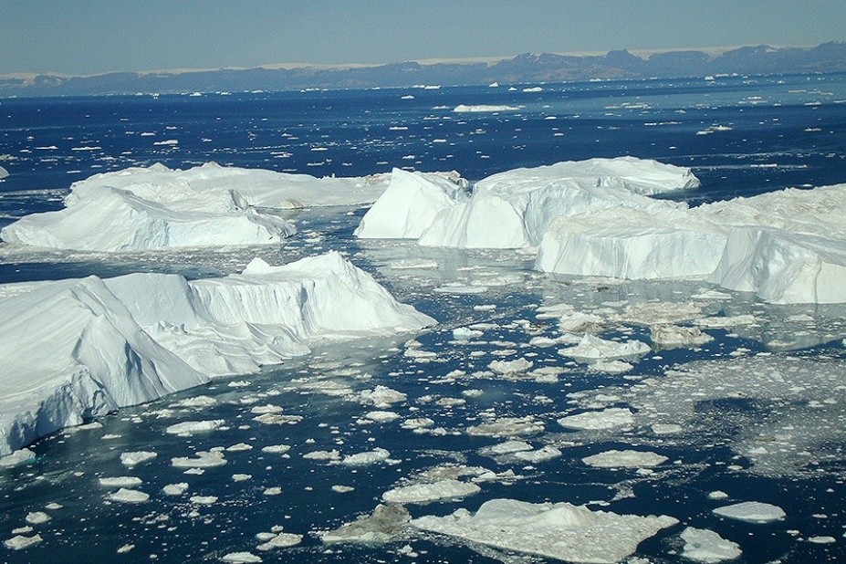 Icebergs floating in the sea. 