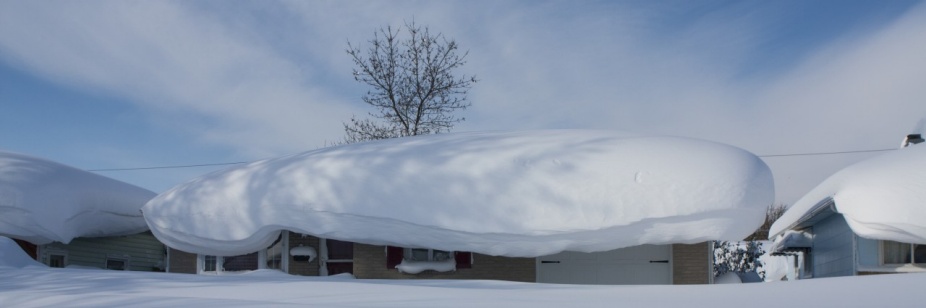 House roof covered in snow.