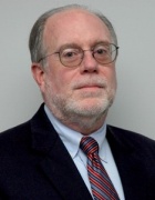 John Campbell in a suit. 