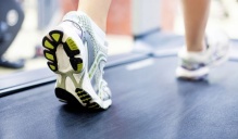 Feet on a treadmill. 