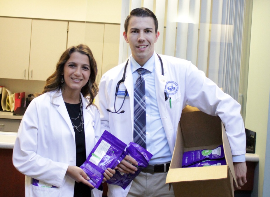 Students holding drug pouches.