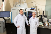 Zoom image: From left: Chemistry faculty members Jason Benedict and Timothy Cook are leading their department&rsquo;s new Research Experiences for Undergraduates (REU) program. Credit: Douglas Levere / University at Buffalo 