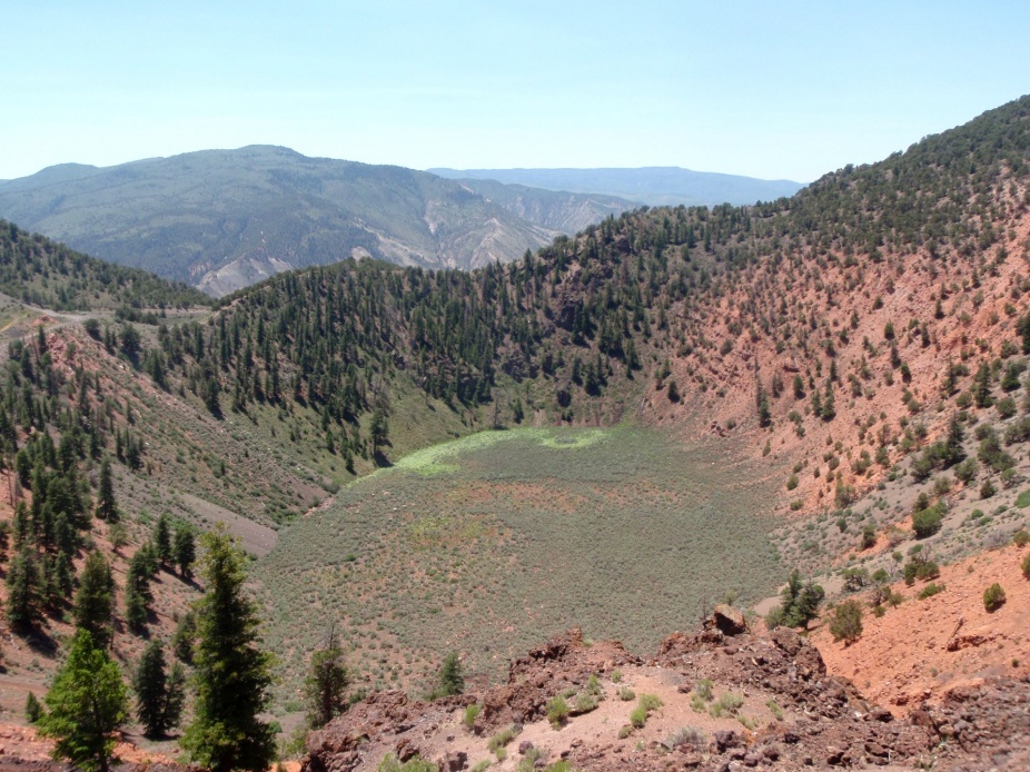 Zoom image: A view of the crater of Dotsero volcano, a monogenetic volcano that erupted in Colorado about 4,000 years ago. Credit: Greg Valentine 