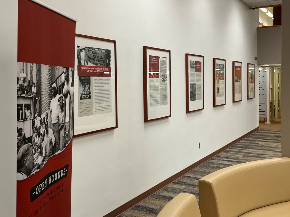Zoom image: The traveling exhibition, "Open Wounds: The Fifty-Year Legacy of the Attica Prison Uprising," in Abbott Library at UB. The exhibition was developed by the New York State Museum. Credit: Douglas Levere / University at Buffalo 