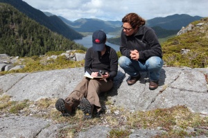 Zoom image: UB biologist Charlotte Lindqvist, right, working in Southeast Alaska several years ago with Alia Lesnek, a UB geology PhD graduate who is now on the faculty of Queens College. A new NSF-funded project will bring UB biologists and geologists together again to study the impacts of prehistoric climate change in the region. Credit: Jason Briner 