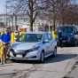 Zoom image: Nate Bolt, assistant director of construction delivery in UB Facilities, gets ready to charge up one of the university&rsquo;s fleet electric vehicles at the new station in the Beane parking lot. Photo: Douglas Levere/University at Buffalo 